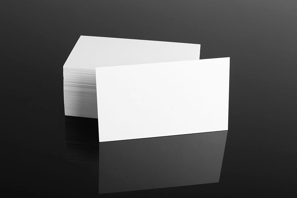 White business cards with black background